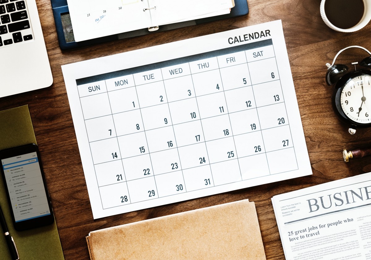 Calendar and clock on a desk
