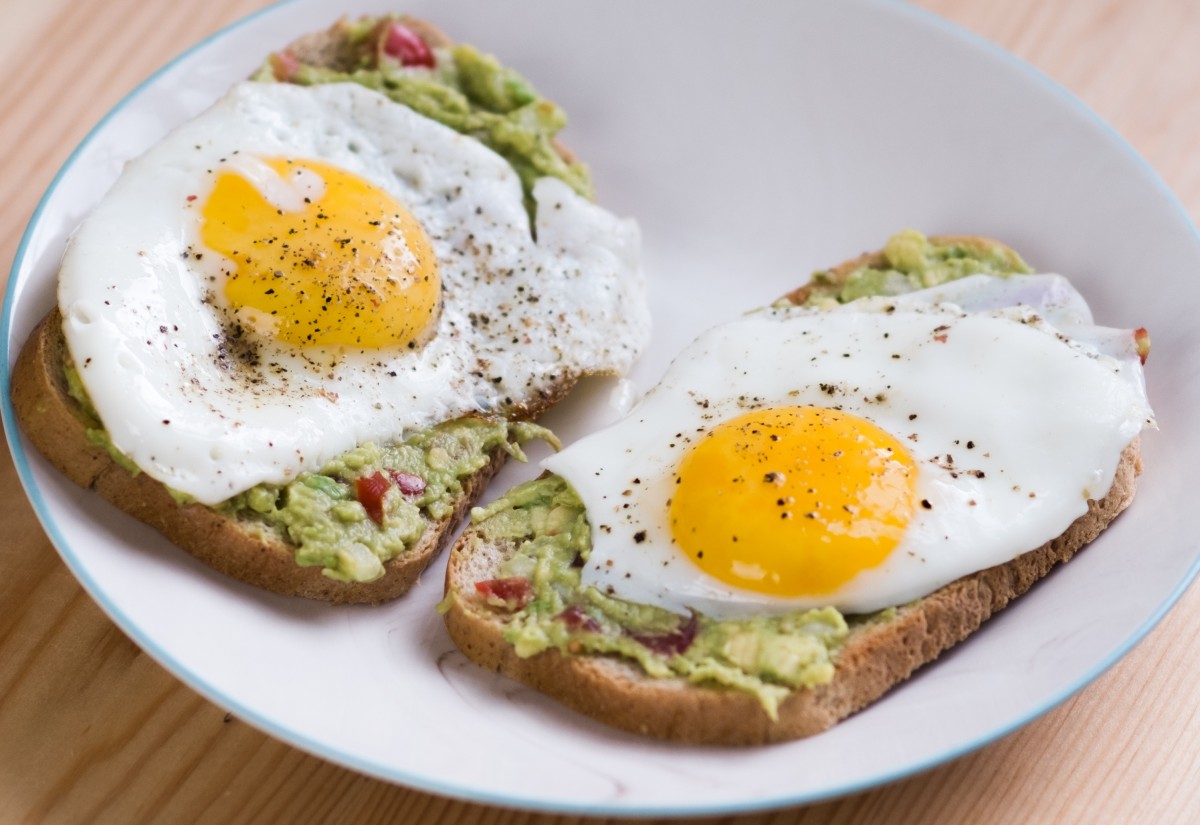 Fried eggs on avocado toast