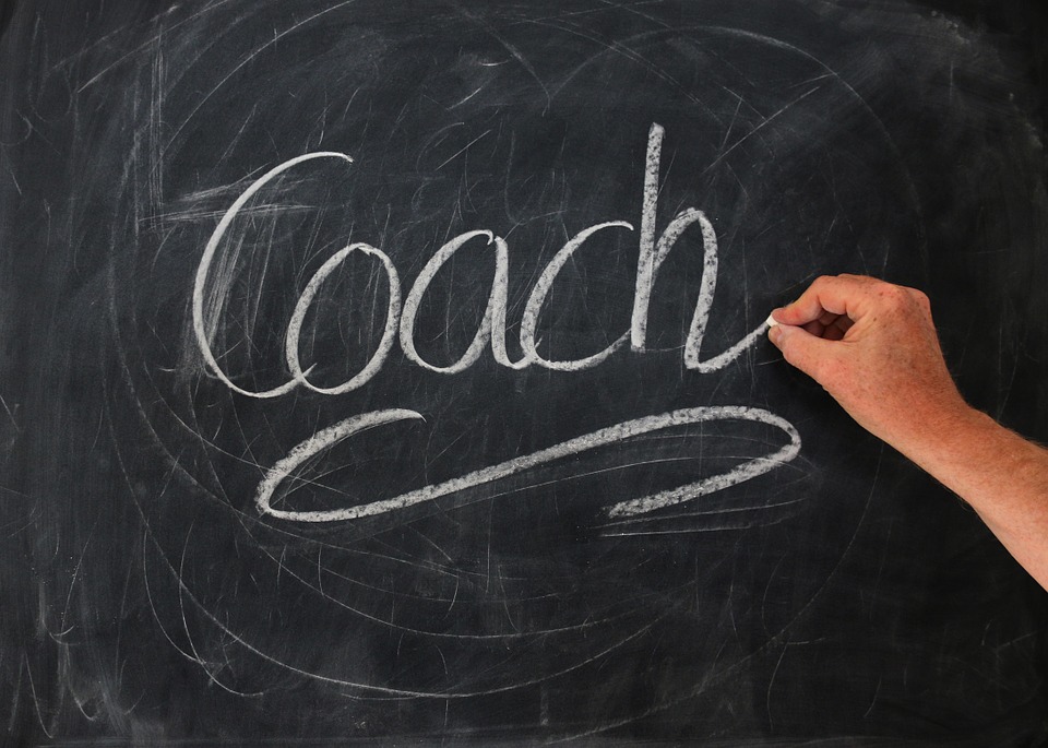 Coach written on chalk board