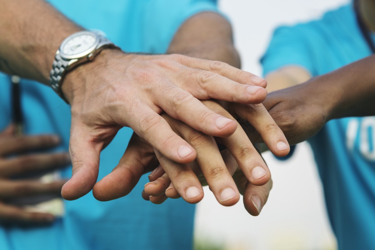 Adult hands touching each other